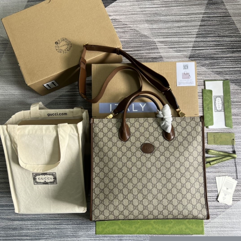 G*u*i shopping bags